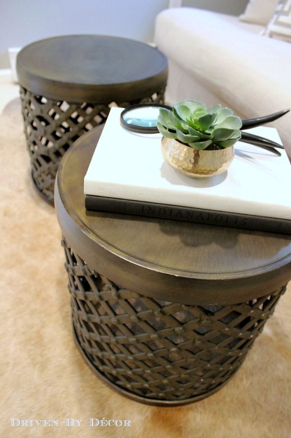 Pair of metal drum tables used in place of a coffee table