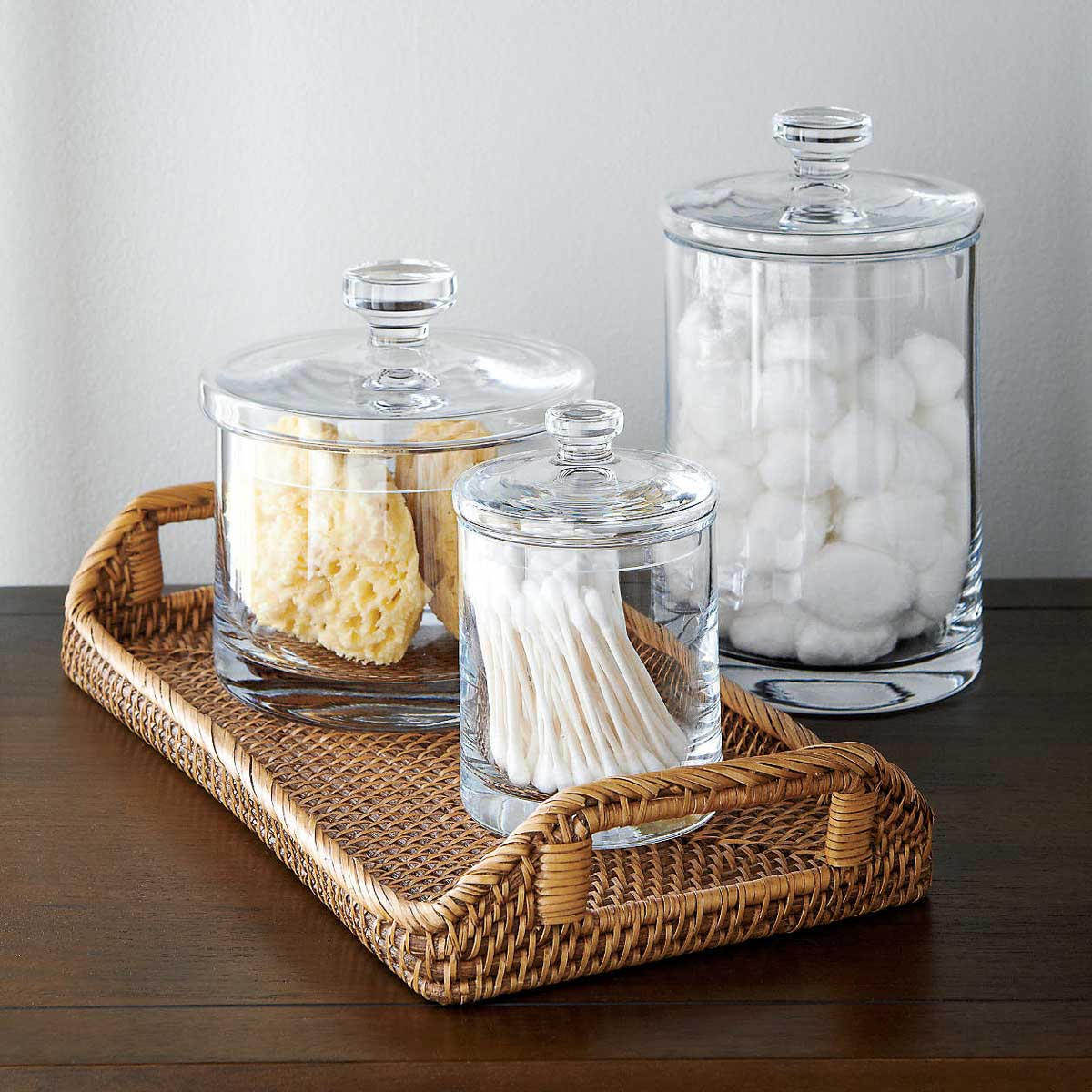 Apothecary jars holding Q-tips and cotton balls