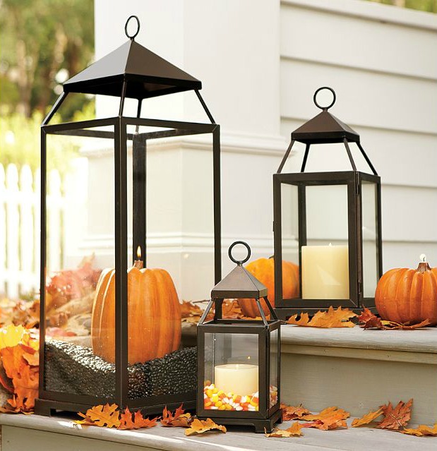 Such a clever way to use lanterns on your front porch in the fall!