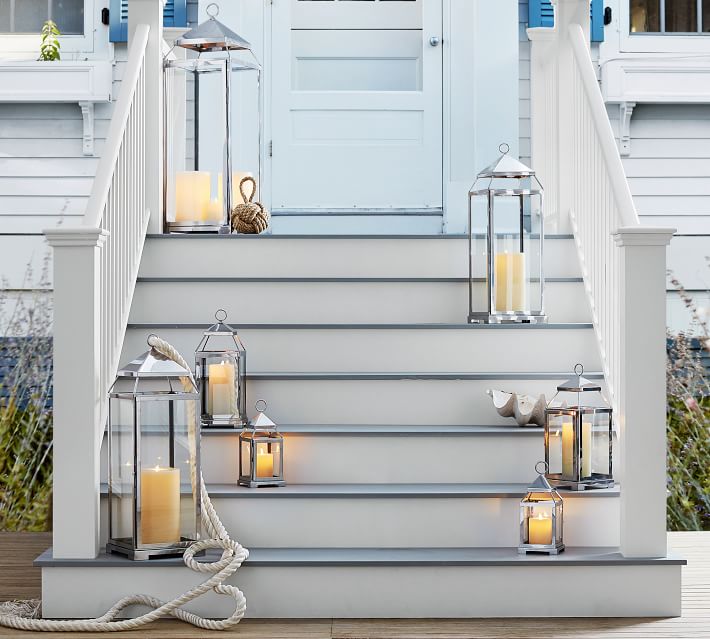 Silver lanterns in various sizes staggered down front steps