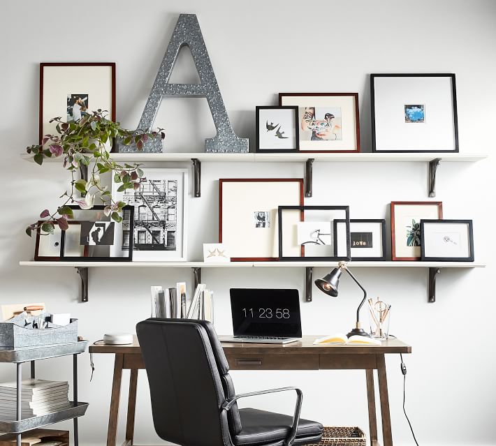 Love how they used a large decorative letter as part of their shelf decor!