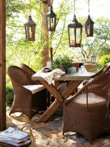 Lanterns hung over table with rope