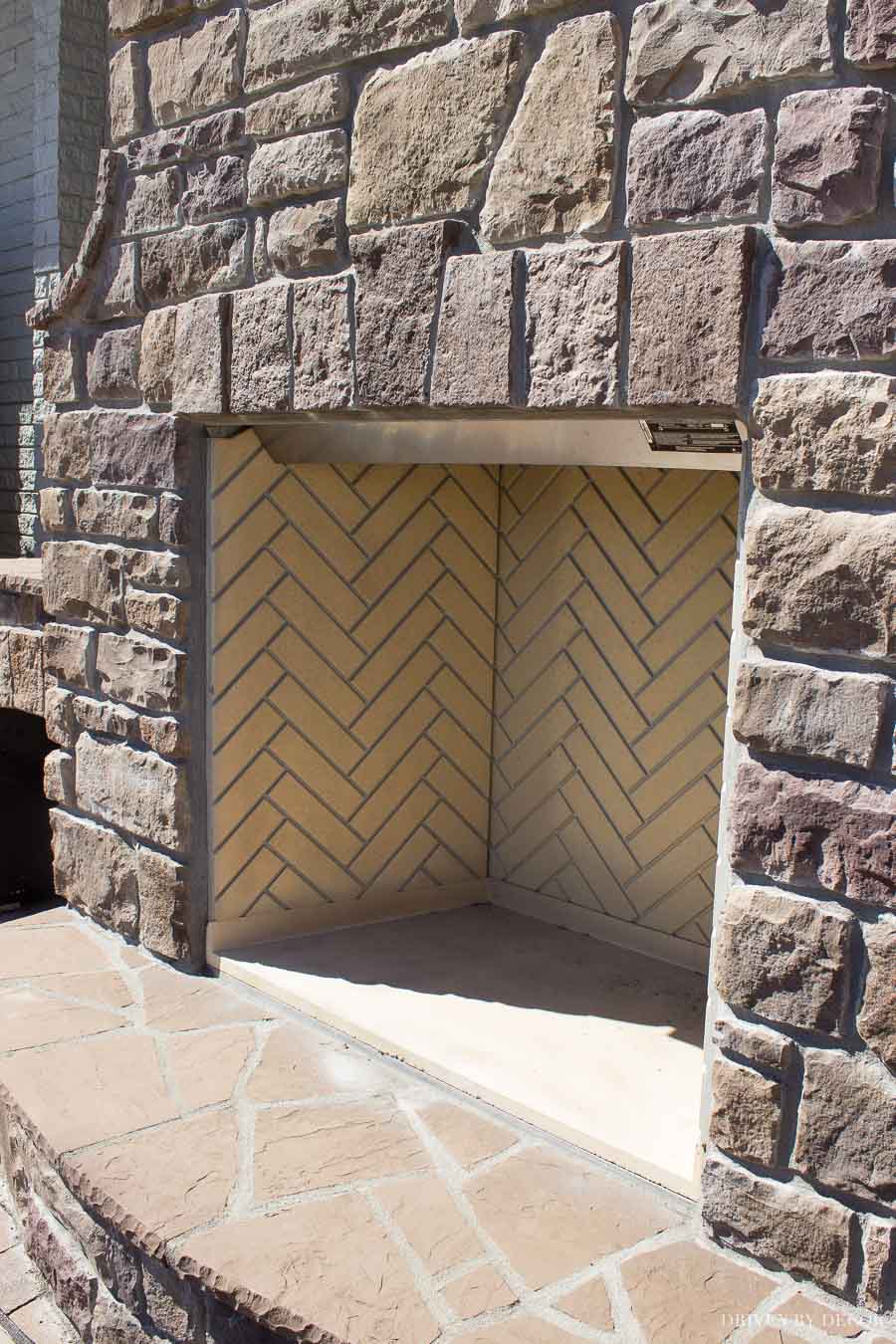 Love the keystone design above the fireplace and the herringbone firebox!