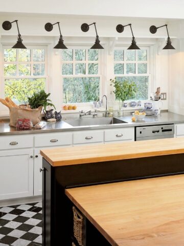 Swing arm sconces in the kitchen - love this look!