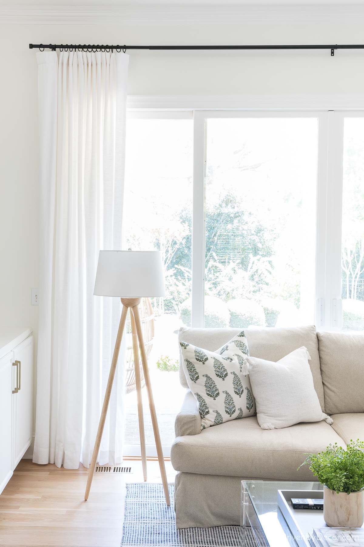 Our white family room drapes - sharing how high to hang them