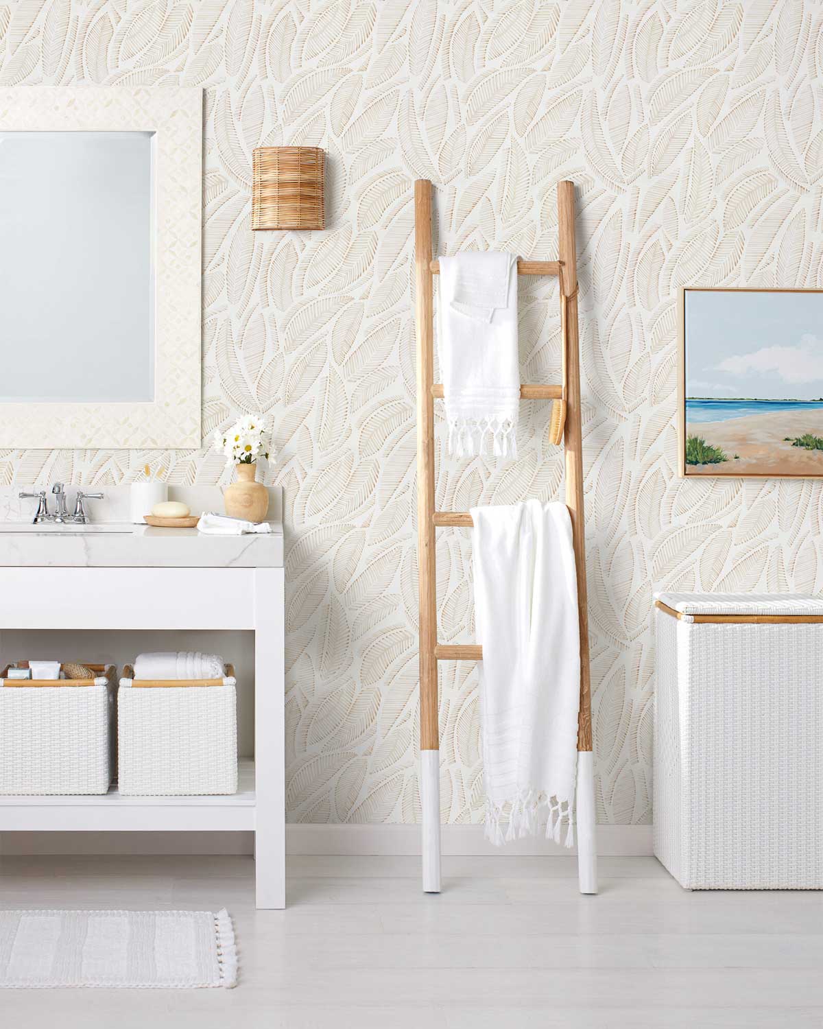 Bathroom towels draped on decorative ladder