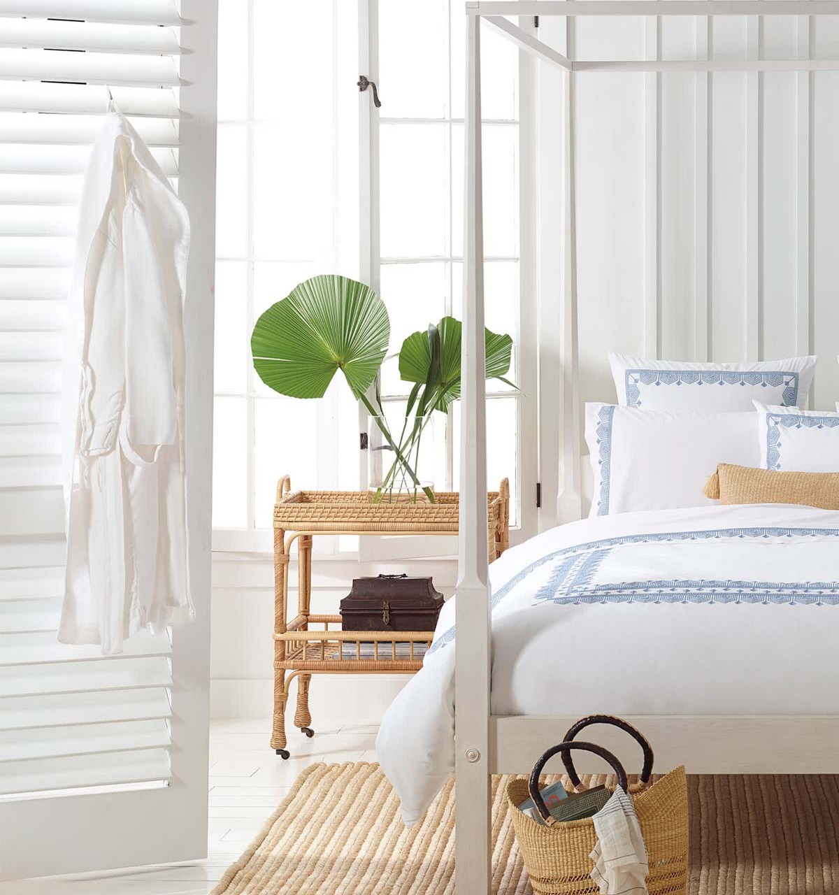 This rolling rattan bar cart makes the cutest unique nightstand!