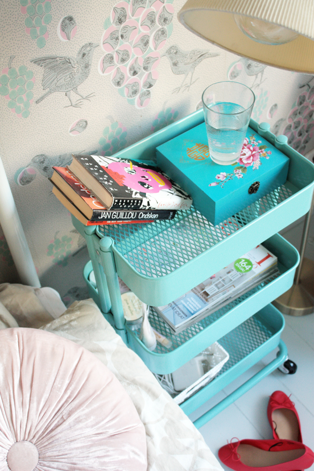 This rolling cart makes a unique small space nightstand