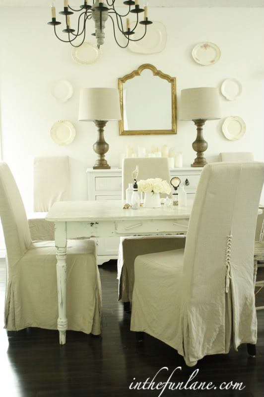 Slipcovered dining room chairs with unique corseted backs