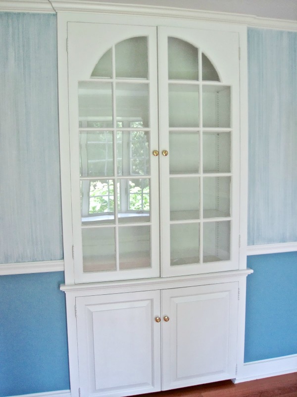 Before pic of built-in dining room china cabinet