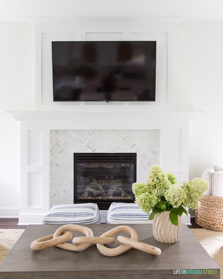 Gorgeous example of how you can hang a TV over the fireplace but still have a beautiful room!