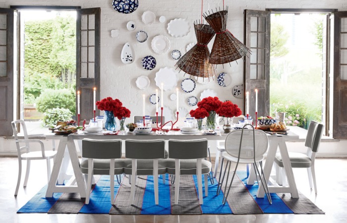 Gorgeous mix of blue and white plates hung on the wall