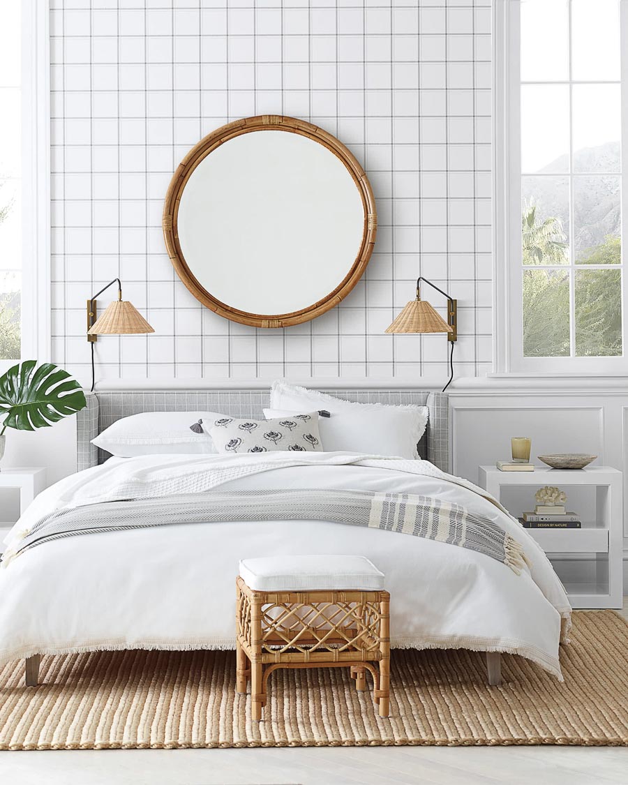 Loving this large round mirror above the bed! Lots of great ideas for above the bed decor in this post!