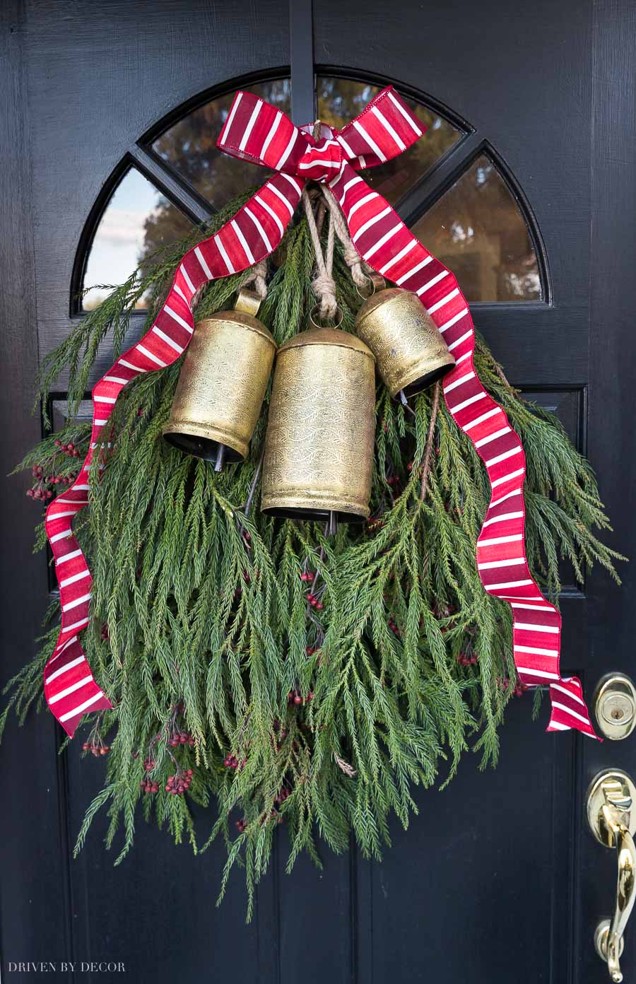 The Christmas door swag on our front door - post includes full tutorial!