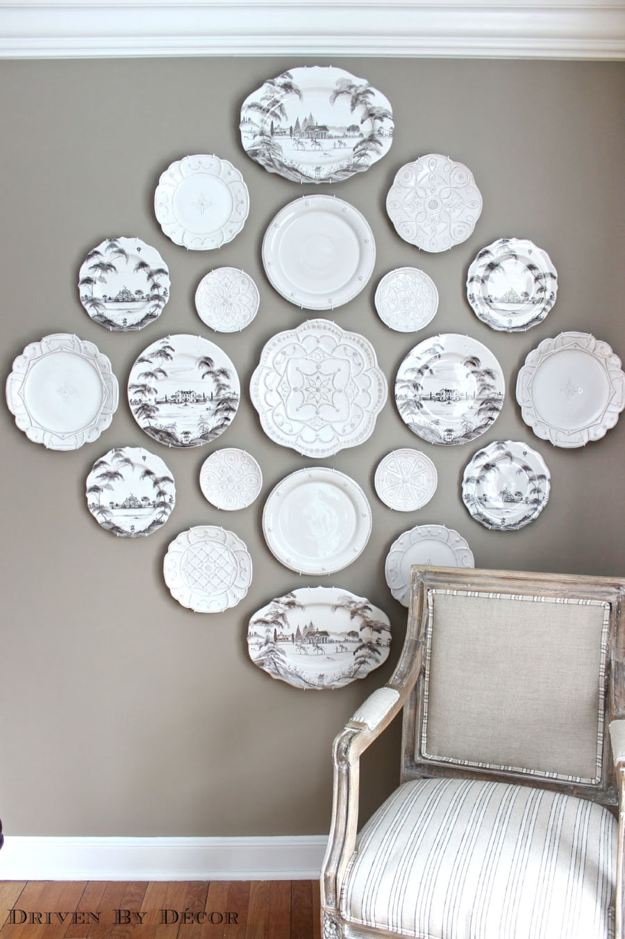 Gorgeous decorative plate wall! This post shows the step by step for how to hang plates on the wall (so they don't fall!)