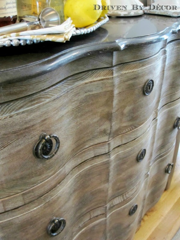 Weathered gray chest in entry