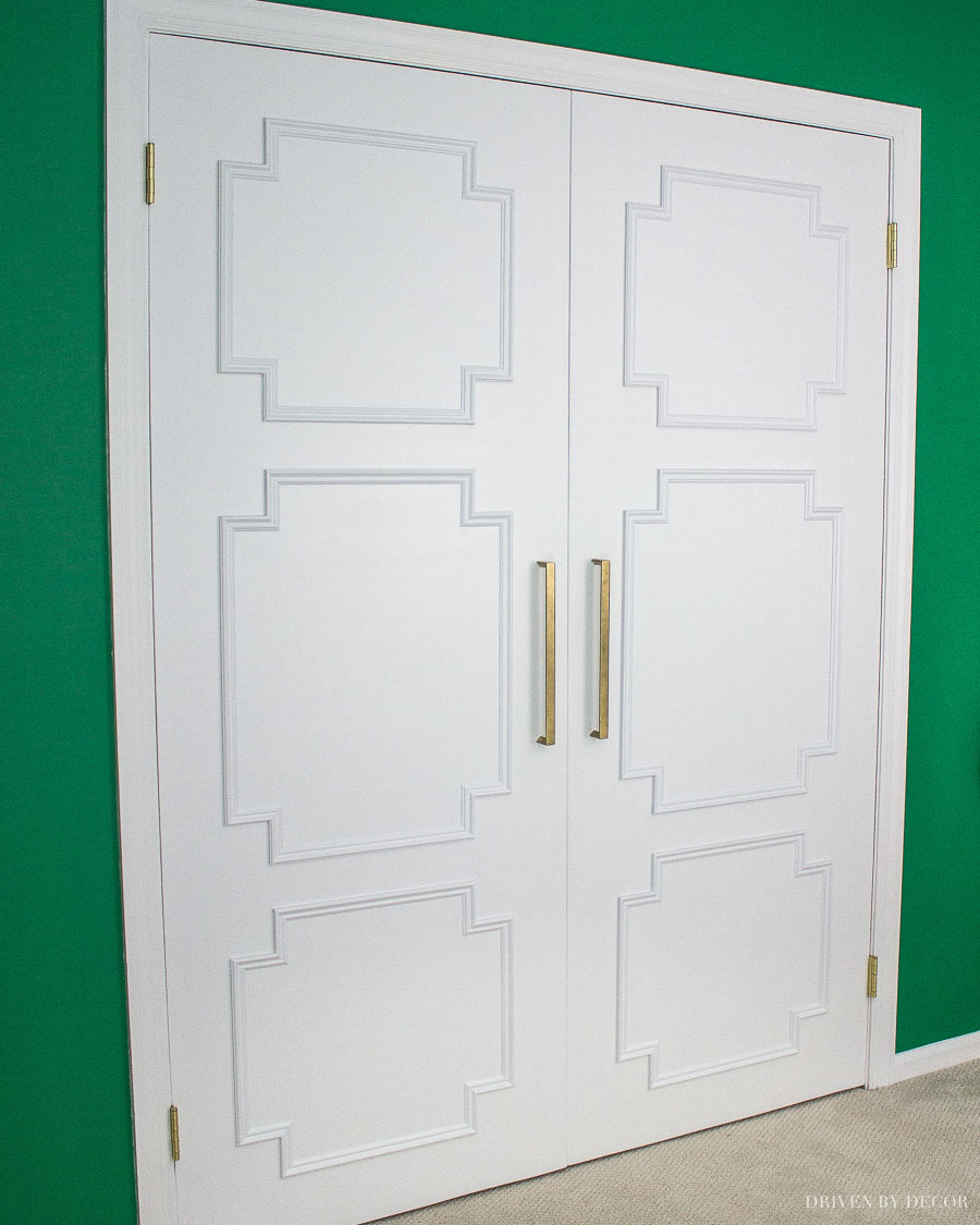 I'm so going to do this to our flat closet doors! Love this flat panel door makeover!