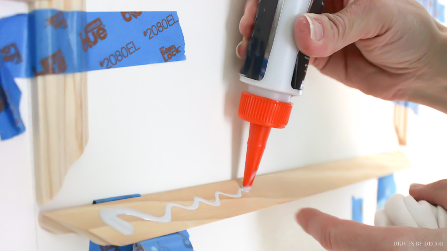 Gluing molding to a flat closet door - love how this turned out!!