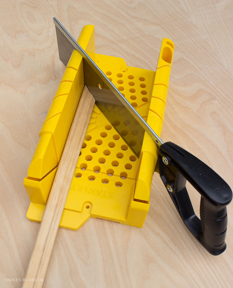 Miter box used to cut molding at a 45 degree angle