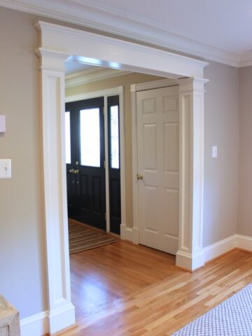 Molding added to a standard doorway makes such a huge difference!