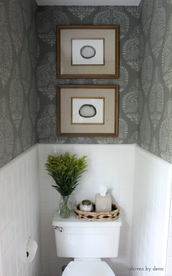 Driven by Decor - Target frames with agate stacked over toilet