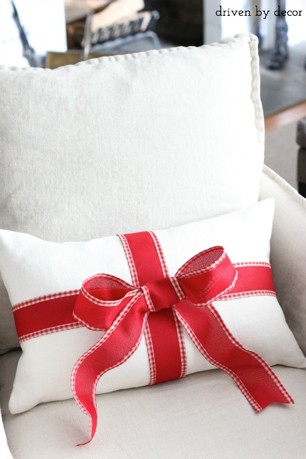 Turn an everyday pillow into a Christmas one with a little ribbon