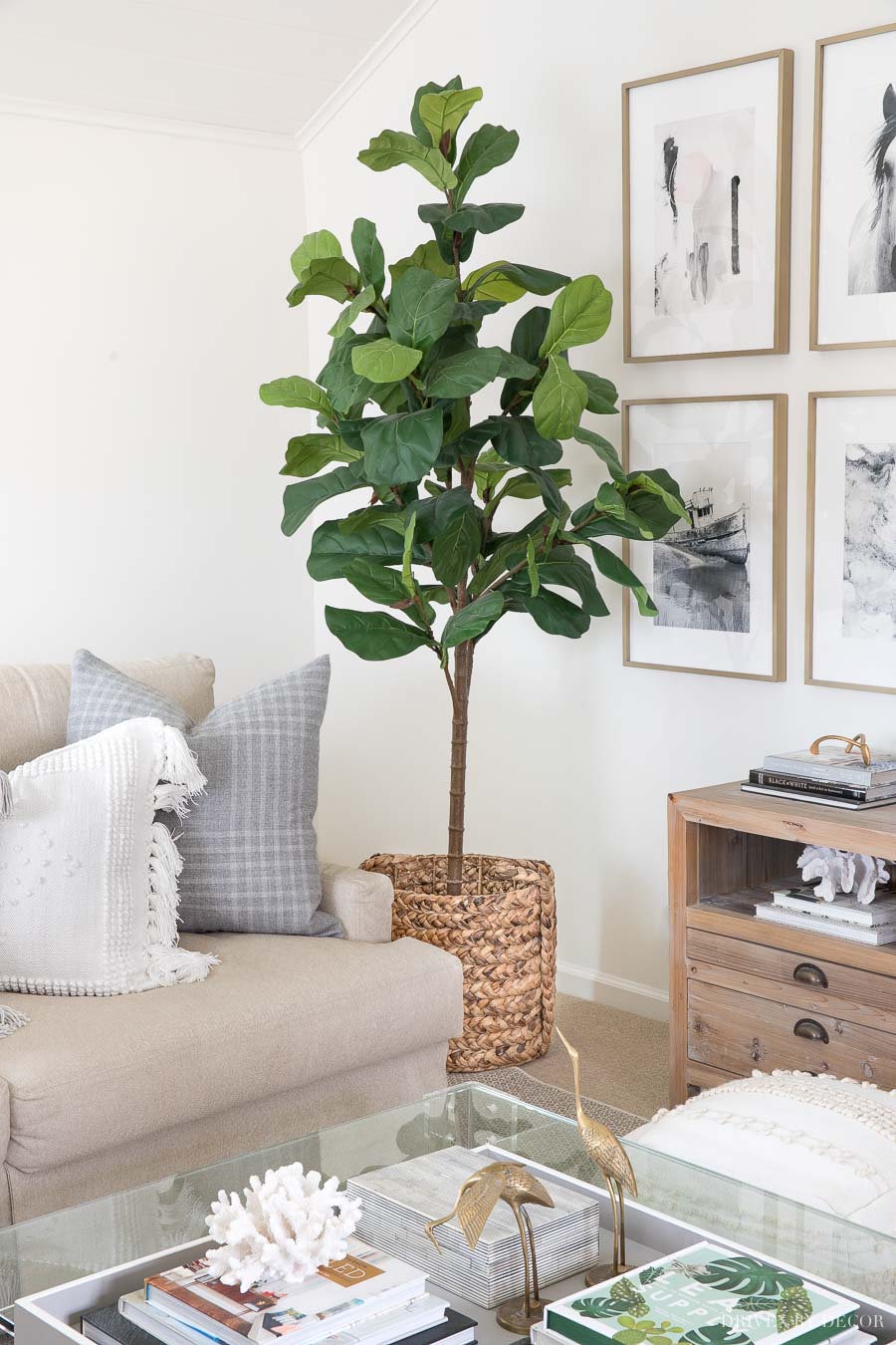 Looks so real! A faux fiddle leaf fig tree in a woven basket fills this living room corner beautifully!