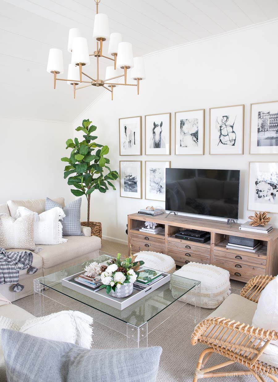 Of all the living room corner ideas, this is my fave - a faux fiddle leaf fig tree in a woven basket!