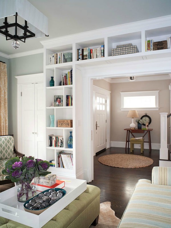 Bookcase surrounding doorway