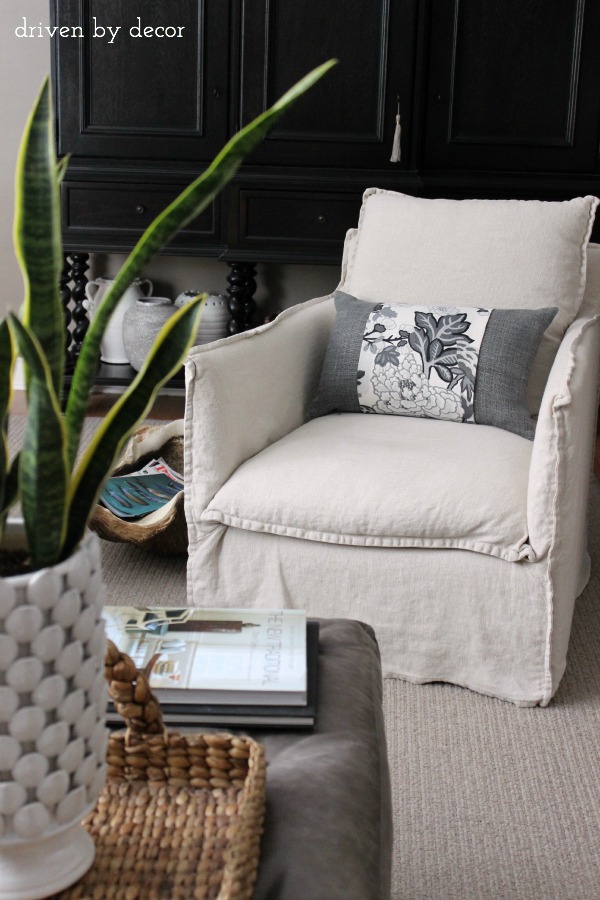 Love these slipcovered swivel chairs - they're the ones our whole family fights to sit in!