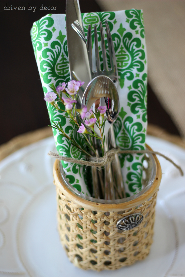 Tie a small floral sprig with silverware