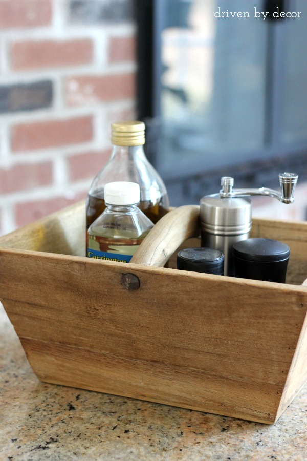 Wood caddy to corral oils and spices by stove