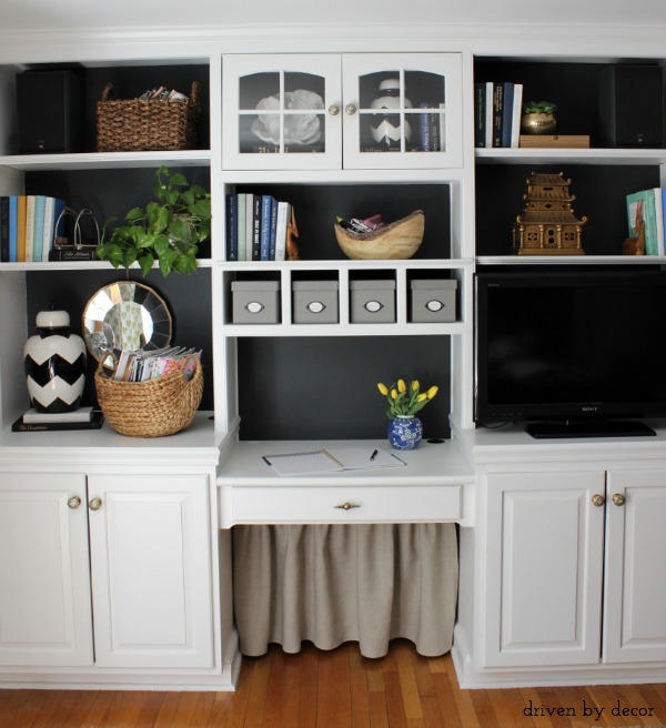 Home office bookcase with DIY skirt to cover cord clutter