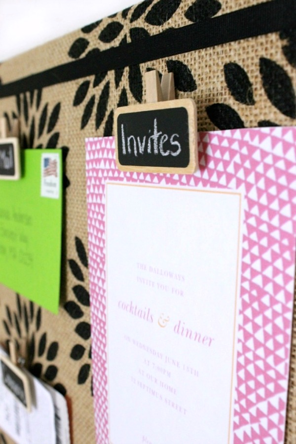 Love the idea of using re-writeable chalkboard clips like this for a bulletin board