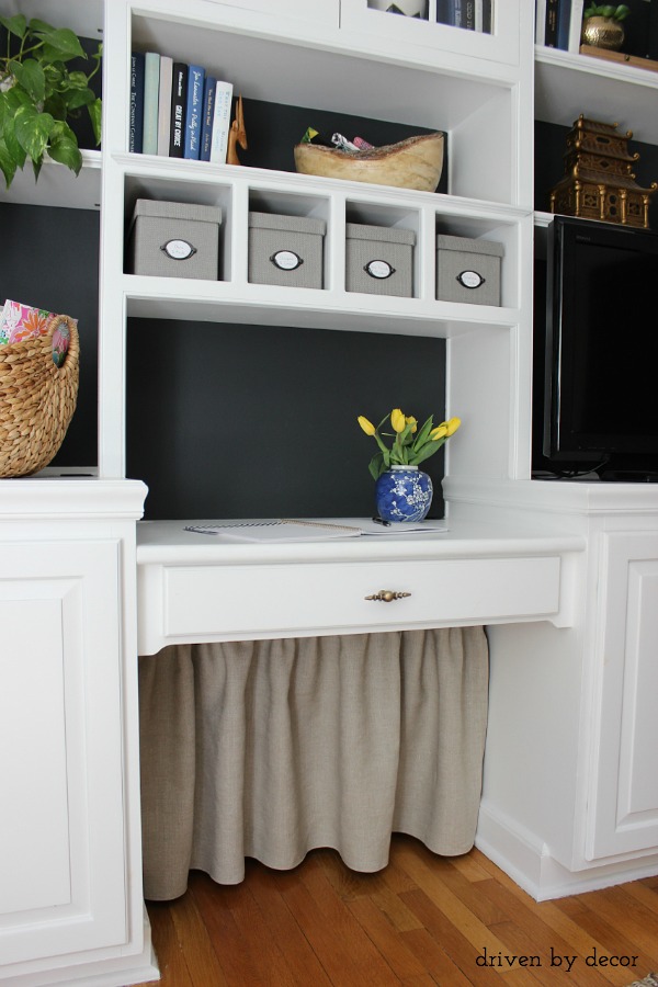 Simple DIY skirt used to hide all of that under the desk cord clutter!