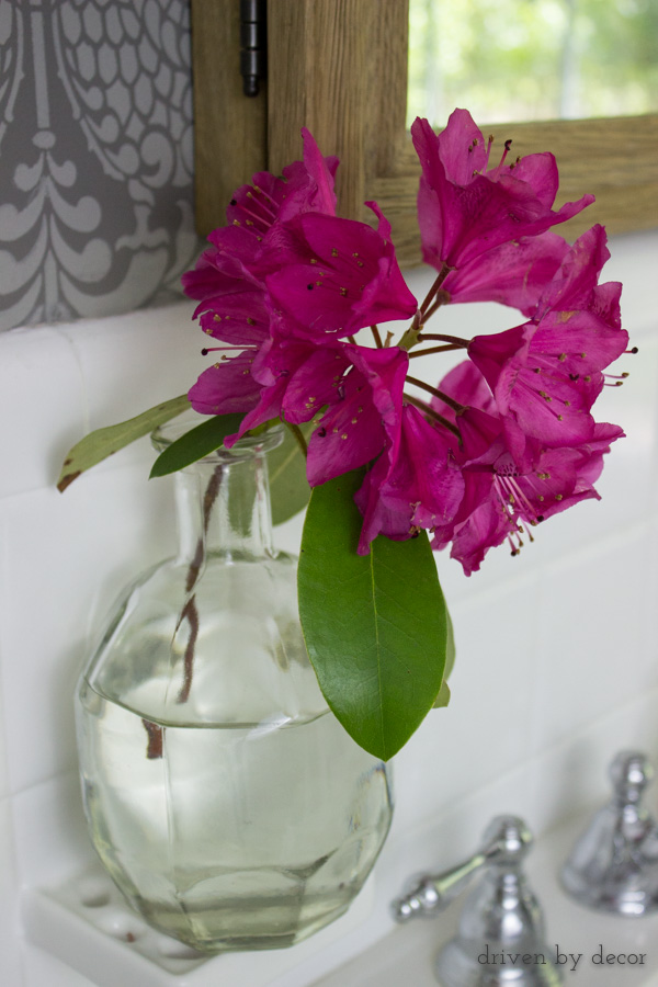 Lettering removed from a bourbon bottle to make a beautiful bud vase