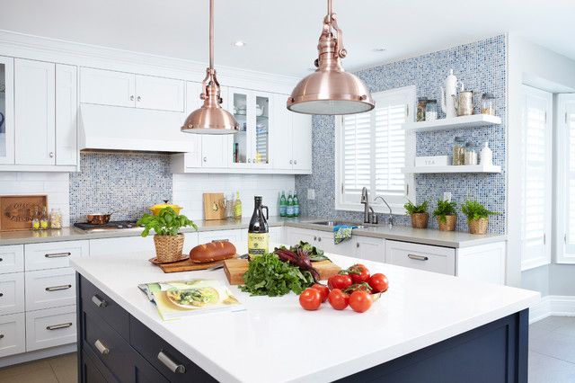 Love the copper pendants in this white kitchen