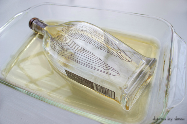 Soak bottles in apple cider vinegar to remove lettering on bottles