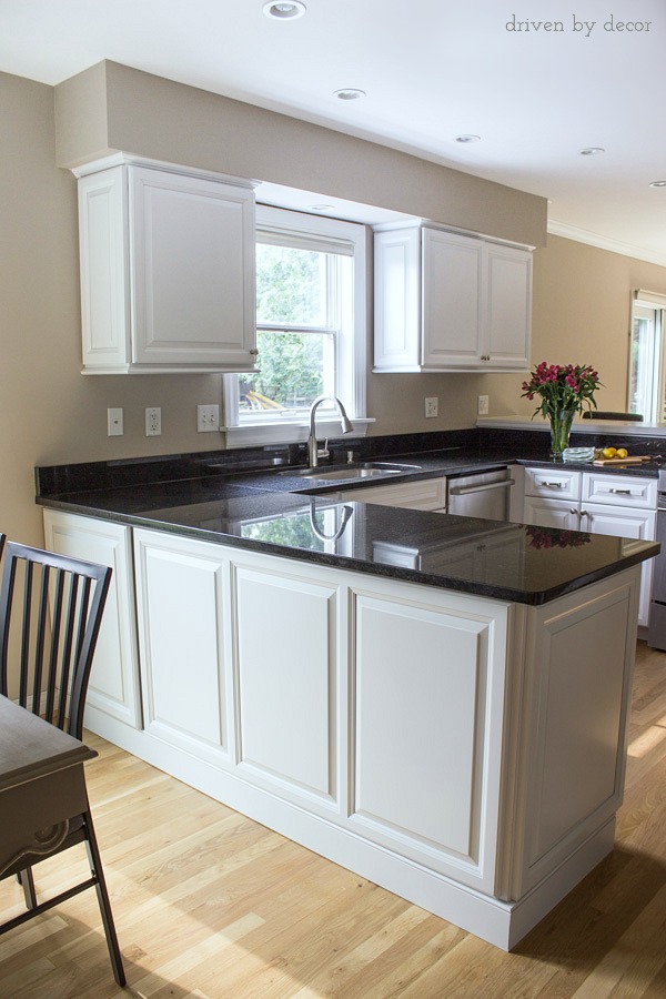 Budget kitchen remodel with refaced cabinets and new granite