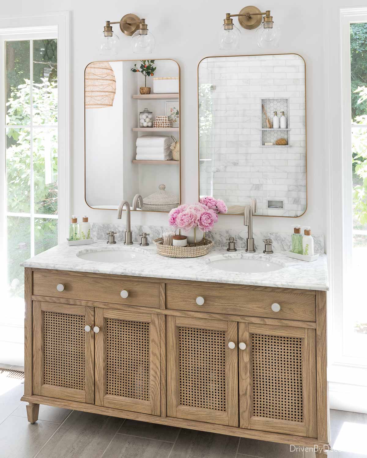 Double vanity with mirrors and vanity light showing best vanity light height