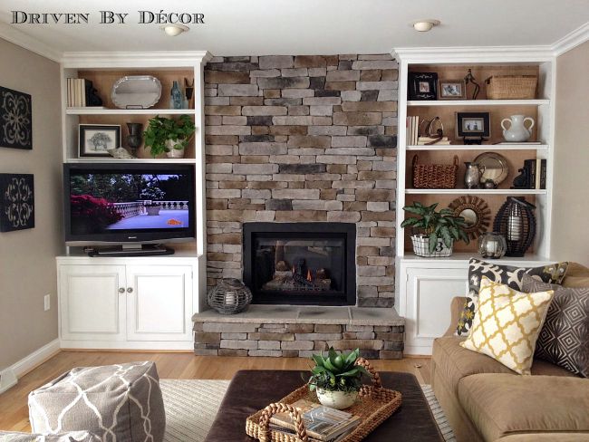 Family room with stacked stone fireplace