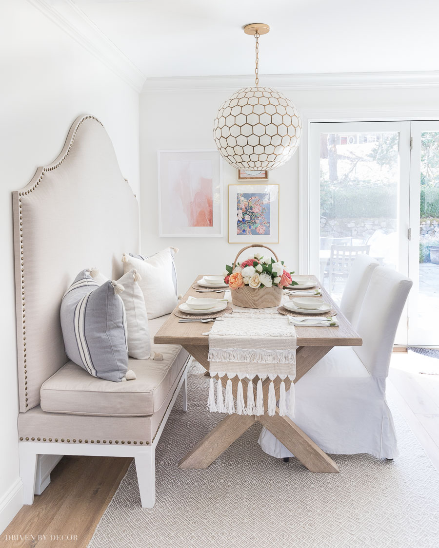 Love this pretty trestle dining table in this kitchen eat-in area!