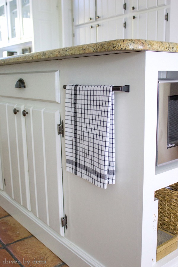 Drawer handle used to hold towel on kitchen island