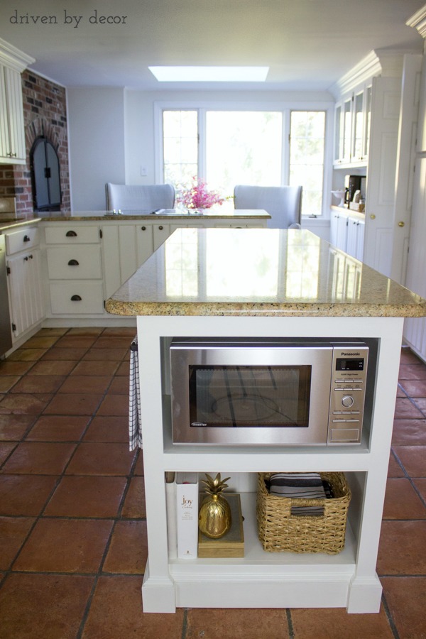 Shelving added to end of island to hold microwave - love!