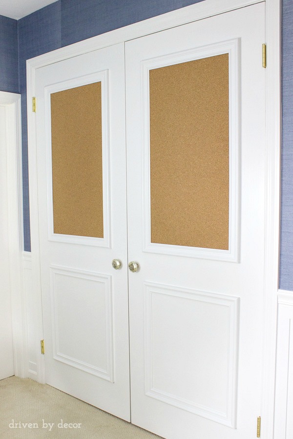 Love this upgrade of flat closet doors! Panel molding was added to both doors, including framed corkboards! So fun for a kid's room!