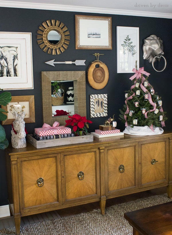 Eclectic gallery wall with long console decorated for Christmas!