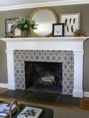 Love the fireplace tile and layered mirror and art on the mantel!