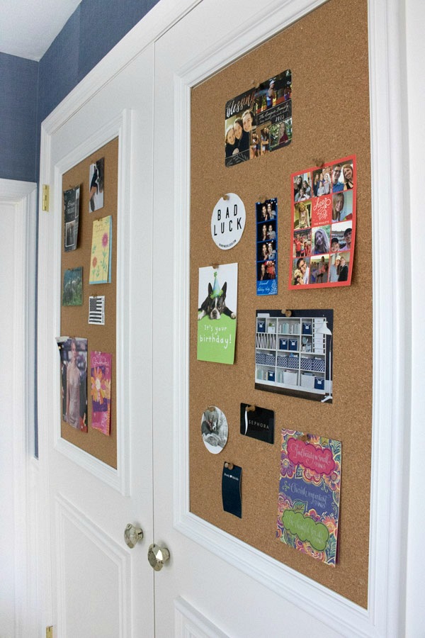 Love this for a kids room - cork boards and molding added to flat closet doors!