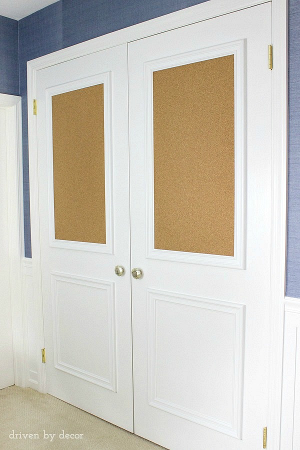 Love this upgrade of flat closet doors! Panel molding was added to both doors, including framed cork boards! So fun for a kid's room!