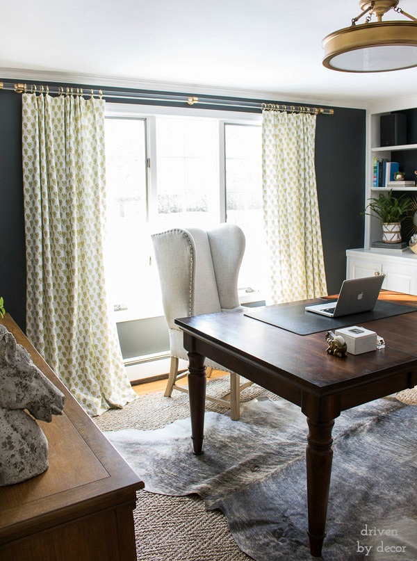 Tip for decorating with neutrals - add a little pop of color like the citrine print of these drapes in an otherwise neutral-filled home office
